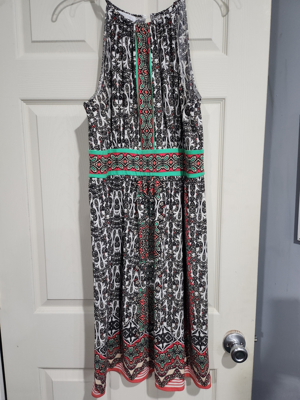 1007. Sleeveless Black & White Printed Halter Dress with Coral and Teal Accents